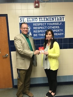 Mr. Hannagan presenting Mrs. Calhoun a Casey's gift card